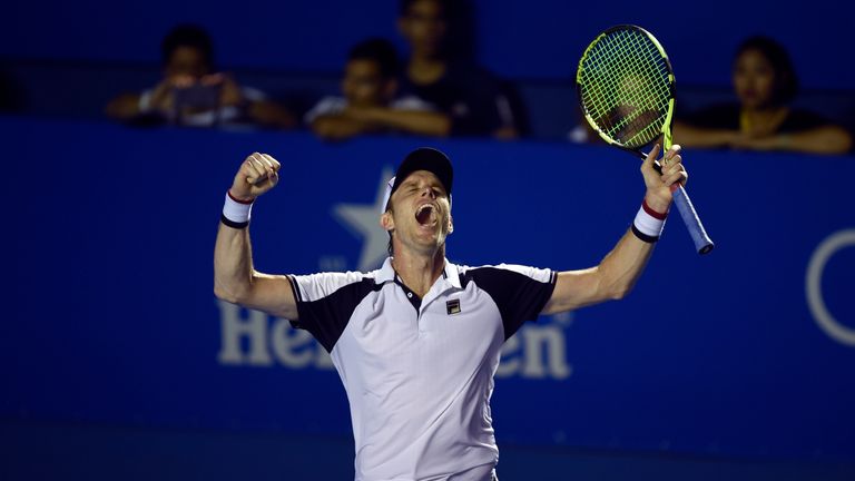 Sam Querrey of the US celebrates beating Rafael Nadal of Spain 6-3, 7-6 (7/3) in the ATP men's singles finals of the Mexican Tennis Open in Acapulco, Guerr