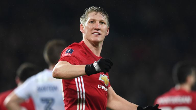 Manchester United's German midfielder Bastian Schweinsteiger celebrates scoring their fourth goal during the English FA Cup fourth round football match bet