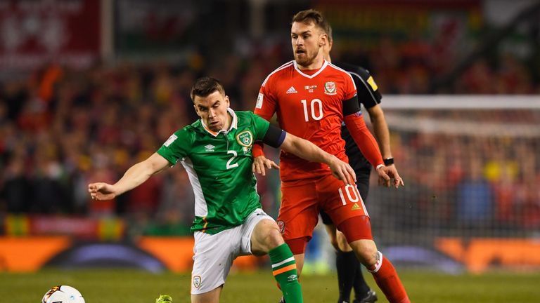 DUBLIN, IRELAND - MARCH 24:  Seamus Coleman of the Republic of Ireland and Aaron Ramsey of Wales battle for the ball during the FIFA 2018 World Cup Qualifi