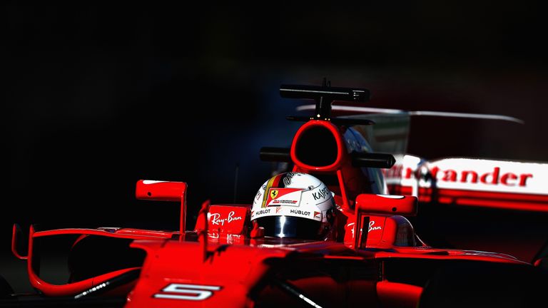 Sebastian Vettel leaves the garage during day three of Formula One winter testing at Circuit de Catalunya