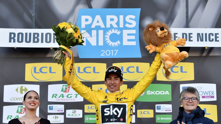 Team Sky's Sergio Henao celebrates his overall leader yellow jersey on the podium at the end of the 177 km seventh stage of Paris-Nice