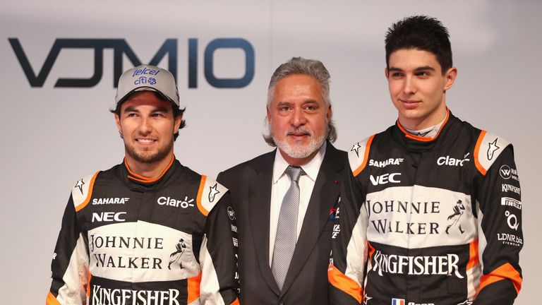 NORTHAMPTON, ENGLAND - FEBRUARY 22:  Sergio Perez (L) of Mexico and Sahara Force India, Vijay Mallya (C), Team Principal and Managing Director and Esteban 