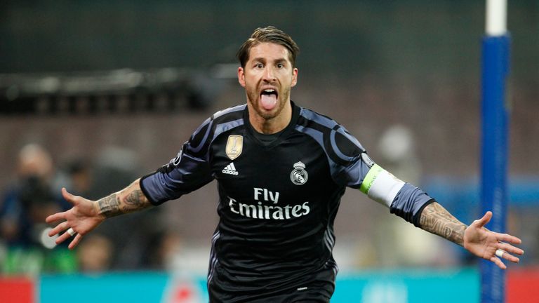 Real Madrid captain Sergio Ramos celebrates after scoring against Napoli