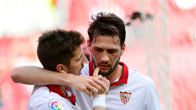 Sevilla's Montenegrin forward Stevan Jovetic (L) celebrates with Sevilla's French forward Wissam Ben Yedder after scoring during the Spanish league footbal