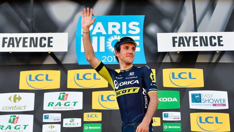 Stage winner Great Britain's Simon Yates celebrates on the podium after winning the 193,5 km sixth stage of the 75th edition of the Paris-Nice cycling race