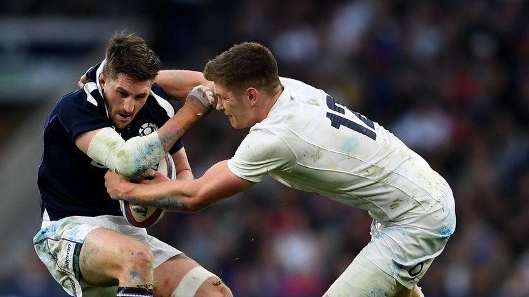 LONDON, ENGLAND - MARCH 11: Henry Pyrgos of Scotland (L) is tackled by Owen Farrell of England (R) during the RBS Six Nations match between England and Sco