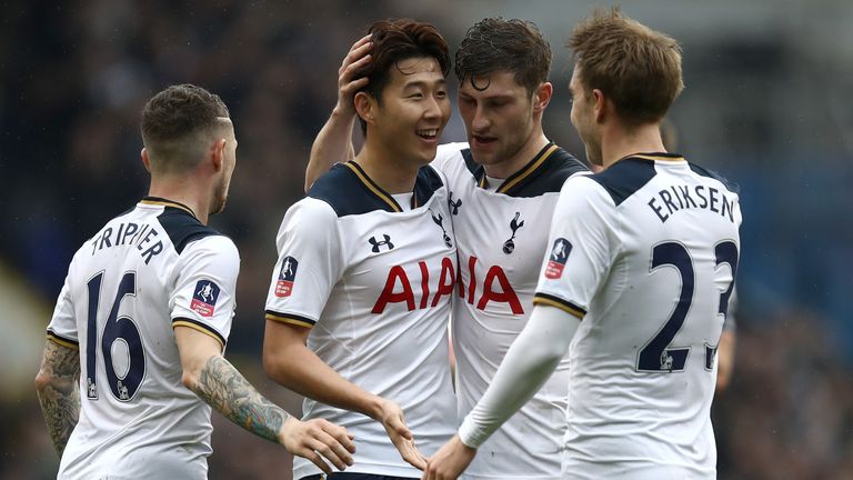 Heung-Min Son is congratulated by team-mates after his long-range strike put Spurs 2-0 up against Millwall