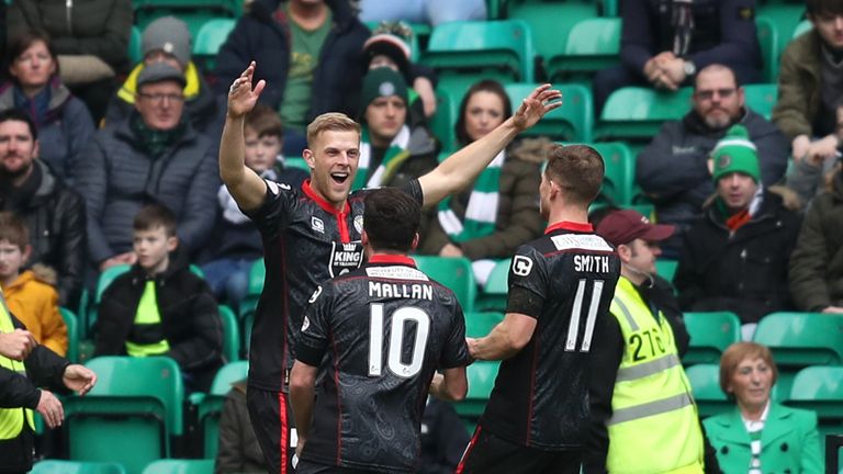 St Mirren's Harry Davis (left) celebrates scoring his side's first goal of the game with teammates Stephen Mallan (left) and Cammy Smith during the Active 