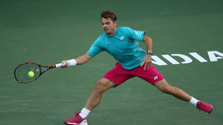 INDIAN WELLS, CA - MARCH 13:  Stanislas Wawrinka of Switzerland plays a forehand against Philipp Kohlschreiber of Germany in their third round match during