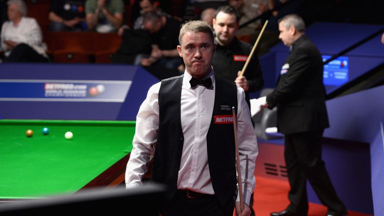 Stephen Hendry leaves the table after the first session of his quarter-final match against Stephen Maguire in World Snooker Championship