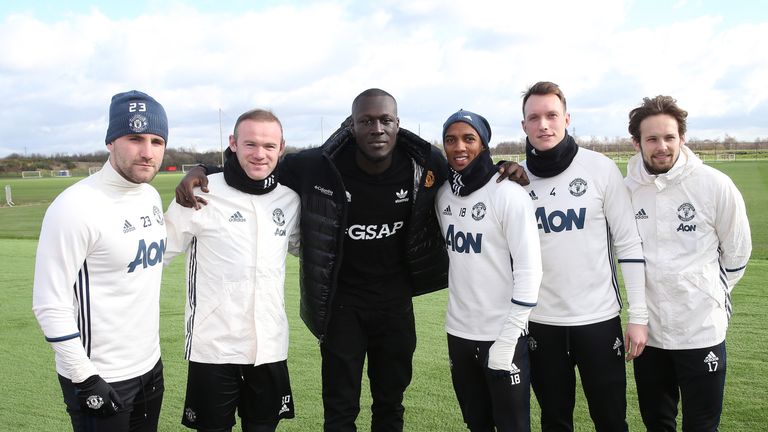 MANCHESTER, ENGLAND - MARCH 02:  (EXCLUSIVE COVERAGE) Luke Shaw, Wayne Rooney, Ashley Young, Phil Jones and Daley Blind of Manchester United meet musician 