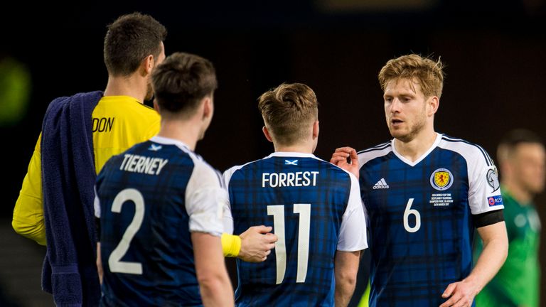 26/03/17 FIFA WORLD CUP QUALIFYING . SCOTLAND v SLOVENIA (1-0) . HAMPDEN PARK - GLASGOW . Scotland's James Forrest and Stuart Armstrong at full-time
