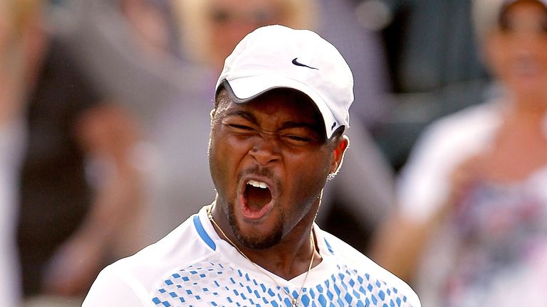 Donald Young celebrates match point against Andy Murray of Great Britain Donald Young during the BNP Paribas Open at the Indian Wells in 2011