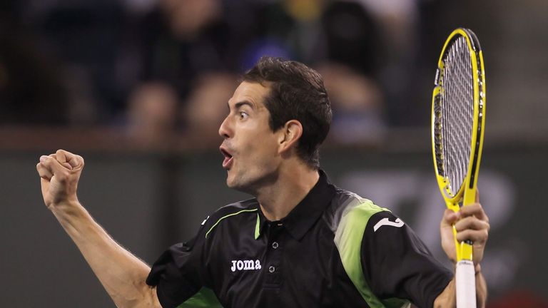 Guillermo Garcia-Lopez of Spain celebrates following his victory over Andy Murray at Indian Wells in 2012