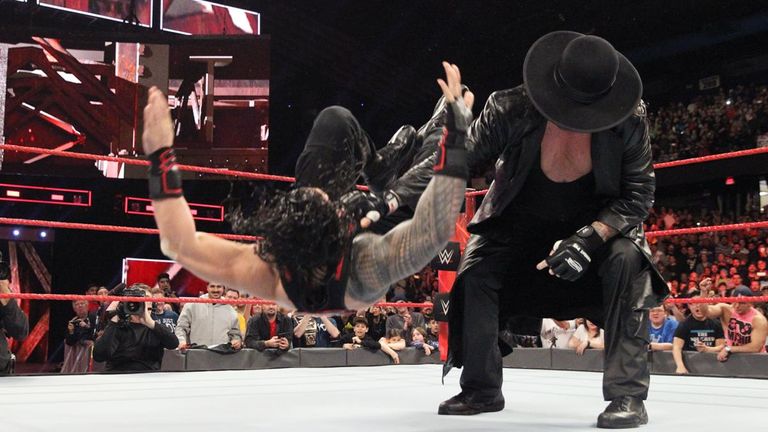 WWE Raw - Undertaker chokeslams Roman Reigns