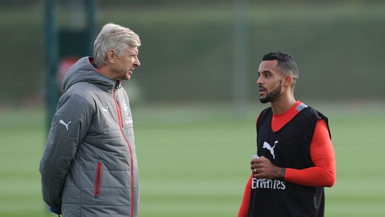 Theo Walcott says the Arsenal players need to take the pressure off manager Arsene Wenger