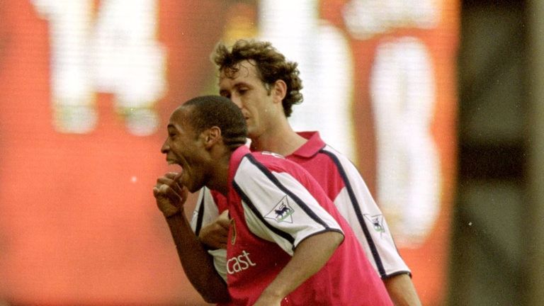 Thierry Henry celebrates sensational strike against Manchester United in 2000