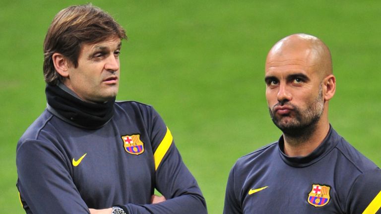 C Barcelona's coach Josep Guardiola (R) and deputy coadh Tito Vilanova 