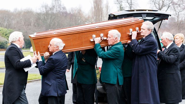 Tommy Gemmell's coffin is carried by Willie Henderson (left) Bobby Lennox and Alex Gordon (right)