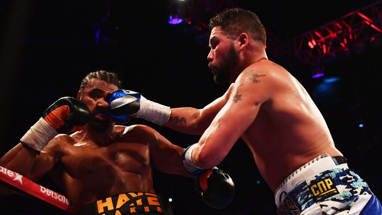 LONDON, ENGLAND - MARCH 04:  David Haye (black trunks) and Tony Bellew (blue trunks) in action during their Heavyweight contest at The O2 Arena on March 4,