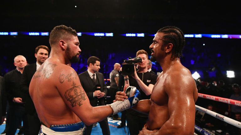 Tony Bellew (L) shakes hands with David Haye after his 11th round TKO victory