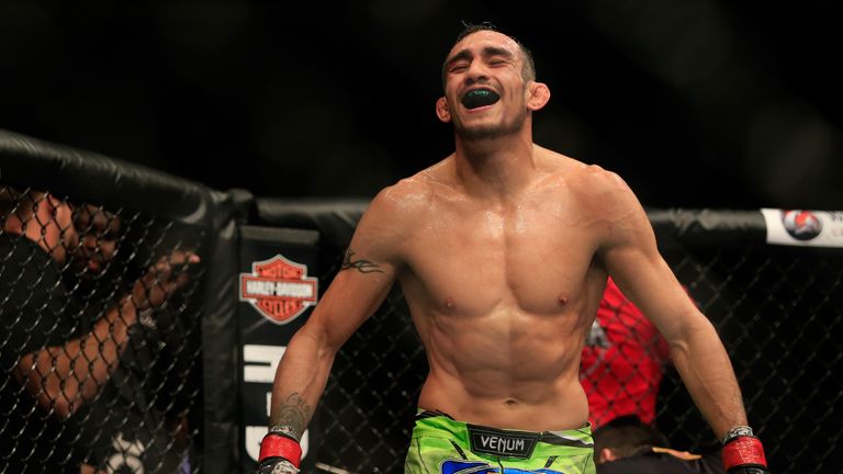 Tony Ferguson celebrates after defeating Abel Trujillo 