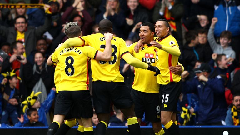 WATFORD, ENGLAND - MARCH 04:  Troy Deeney of Watford (CR) celebrates scoring his sides first goal with his Watford team mates during the Premier League