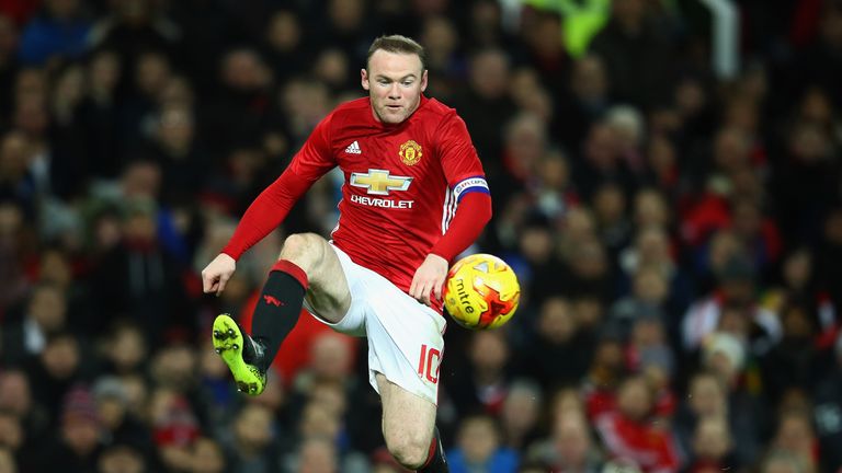 MANCHESTER, ENGLAND - JANUARY 10:  yne Rooney of Manchester United controls the ball during the EFL Cup Semi-Final first leg match between Manchester Unite
