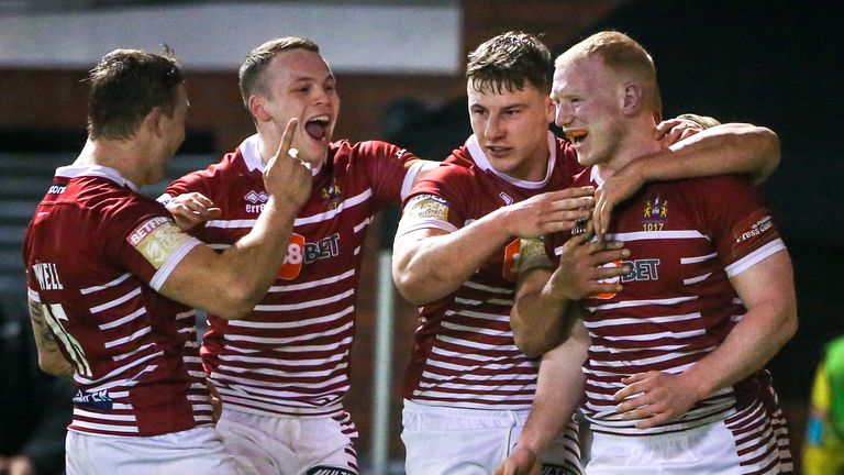 09/03/2017 - Wigan's Liam Farrell (R) celebrates his try with George Williams, Liam Marshall and Sam Powell.