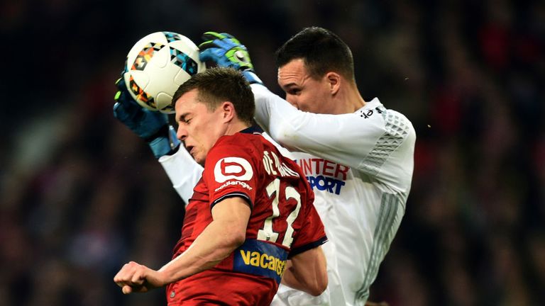 Yohann Pele (right) made a stunning save for Marseille in the closing stages
