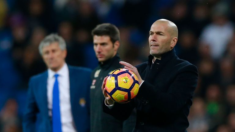 MADRID, SPAIN - MARCH 01: Head coach Zinedine Zidane of Real Madrid CF catchs the ball during the La Liga match between Real Madrid CF and UD Las Palmas at
