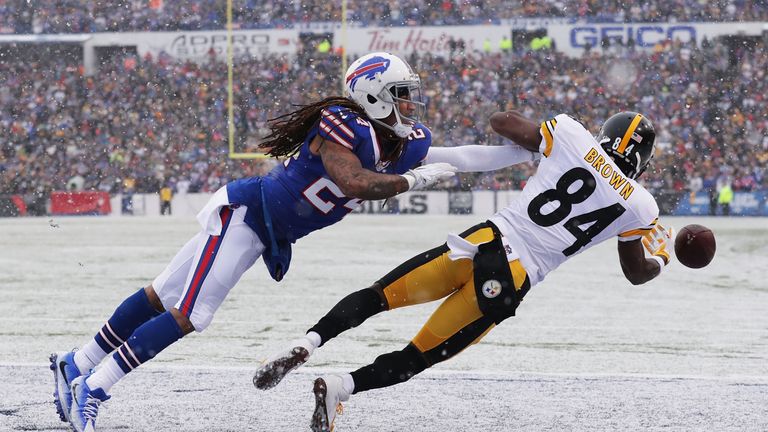 ORCHARD PARK, NY - DECEMBER 11:   Antonio Brown #84 of the Pittsburgh Steelers can't make a catch as  Stephon Gilmore #24 of the Buffalo Bills defends duri