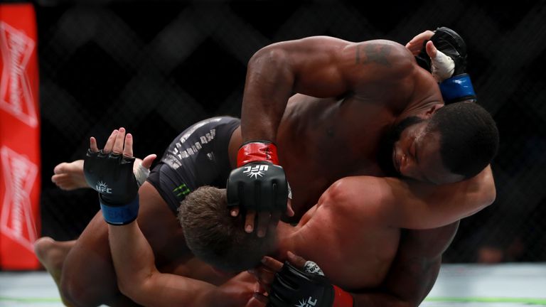 NEW YORK, NY - NOVEMBER 12:  Tyron Woodley of the United States (bottom) fights against Stephen Thompson of the United States in their welterweight champio