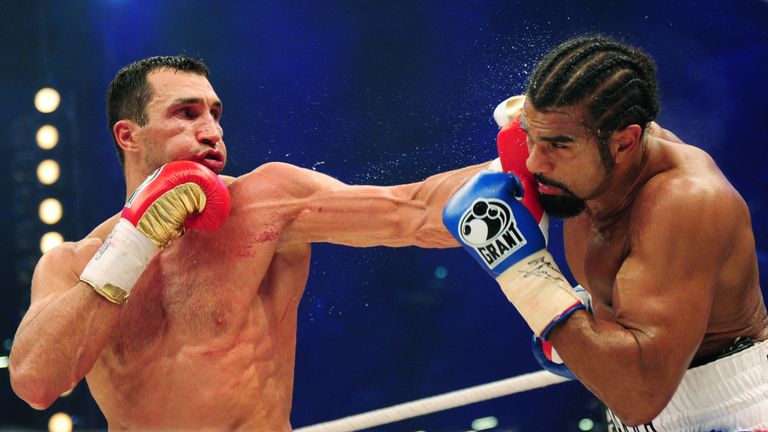 Ukrainian IBF and WBO world champion Wladimir Klitschko (L) and British WBA champion David Haye fight during their heavyweight title boxing match in the no