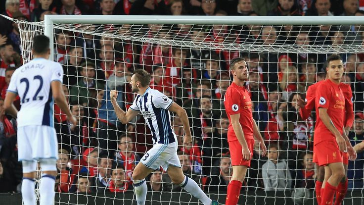  Gareth McAuley of West Bromwich Albion celebrates after scoring a goal during the Premier League match against Liverpool at Anfield in October 2016