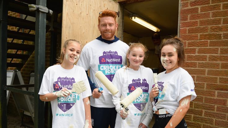 RIPLEY, DERBYSHIRE - APRIL 02: England cricketer Jonny Bairstow poses with some of the voluteers during the NatWest CricketForce event at Denby CC on April