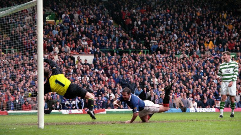 Ally McCoist dives to head Rangers in front against Celtic in their 1998 Scottish Cup final
