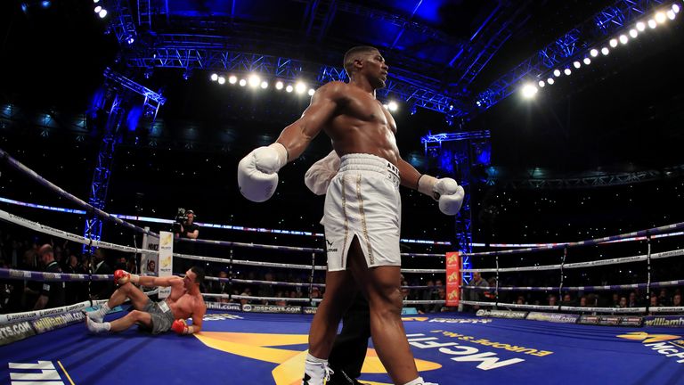 LONDON, ENGLAND - APRIL 29:  Anthony Joshua (White Shorts) puts Wladimir Klitschko (Gray Shorts) down in the 11th round during the IBF, WBA and IBO Heavywe