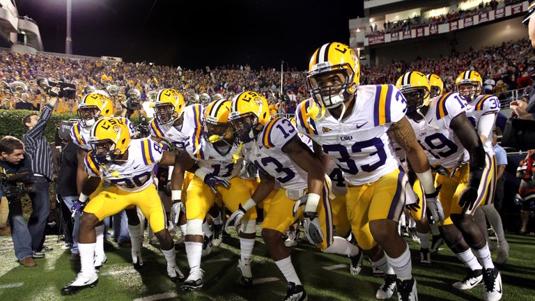 OXFORD, MS - NOVEMBER 19: Jarvis Landry #80, Spencer Ware #11, Ron Brooks #13 and Odell Beckham, Jr. #33 of the LSU Tigers lead their team out on the field