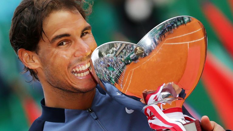 TOPSHOT - Spain's Rafael Nadal holds his trophy during the awarding ceremony following the final tennis match against France's Gael Monfils at the Monte-Ca