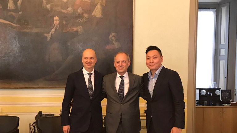 Milan representative Mauro Fassone along with Auro Palomba and new Milan owner Yonghong Li