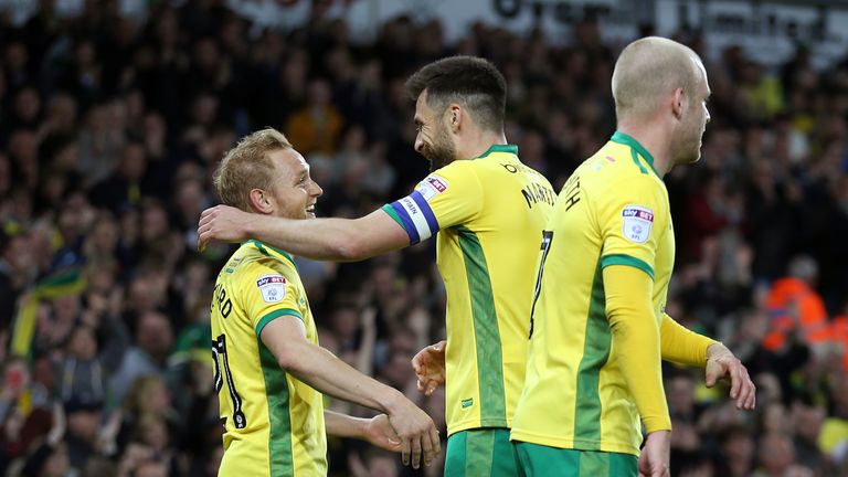 Norwich City's Alex Pritchard (left) celebrates with team-mate Russell Martin after scoring his side's second goal during the Sky Bet Championship match at