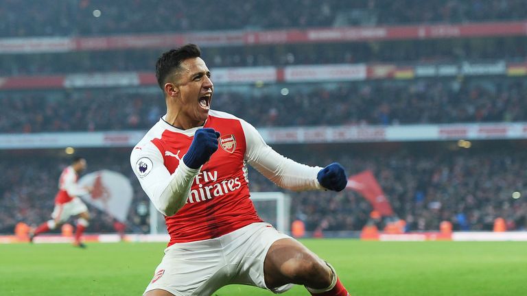 Alexis Sanchez celebrates scoring Arsenal's second goal against Burnley at the Emirates Stadium