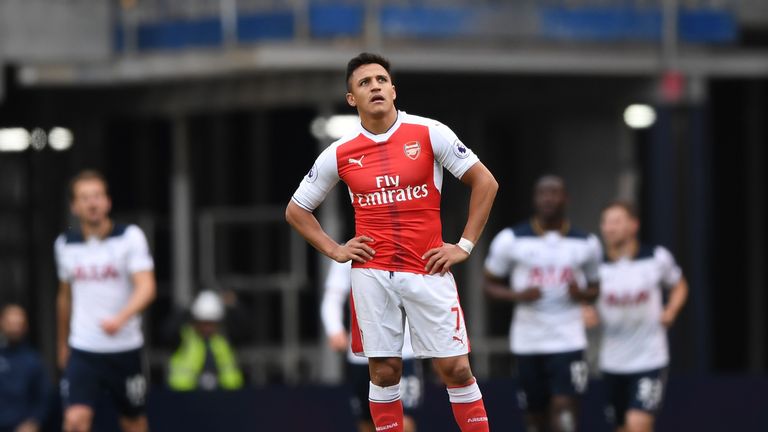 LONDON, ENGLAND - APRIL 30: Alexis Sanchez of Arsenal looks dejected after Tottenham Hotspur first goal during the Premier League match between Tottenham H