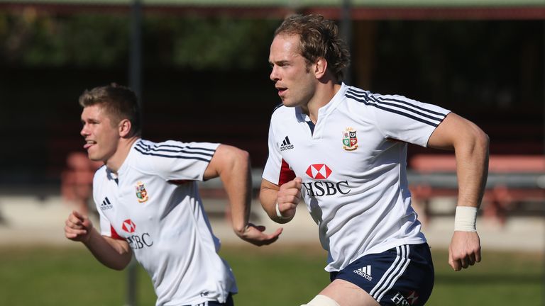 SYDNEY - JULY 05 2013: Alun Wyn Jones (R), the Lions captain, runs with team mate Owen Farrell during the British and Irish Lions Captain's Run