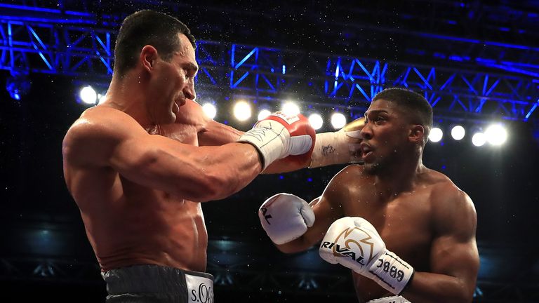 LONDON, ENGLAND - APRIL 29:  Anthony Joshua (White Shorts) and Wladimir Klitschko (Gray Shorts) in action during the IBF, WBA and IBO Heavyweight World Tit