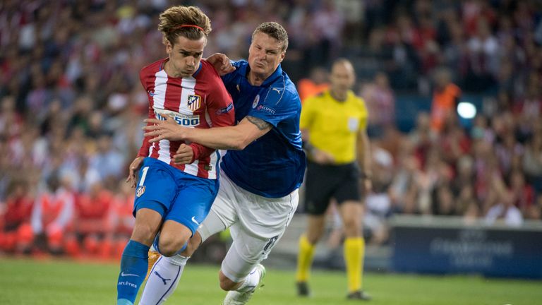 Antoine Griezmann vies with Robert Huth for possession at Vicente Calderón