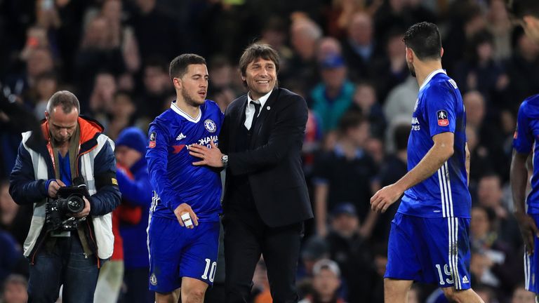 Chelsea manager Antonio Conte and Eden Hazard celebrate at full time during the Emirates FA Cup, Quarter Final match at Stamford Bridge, London.