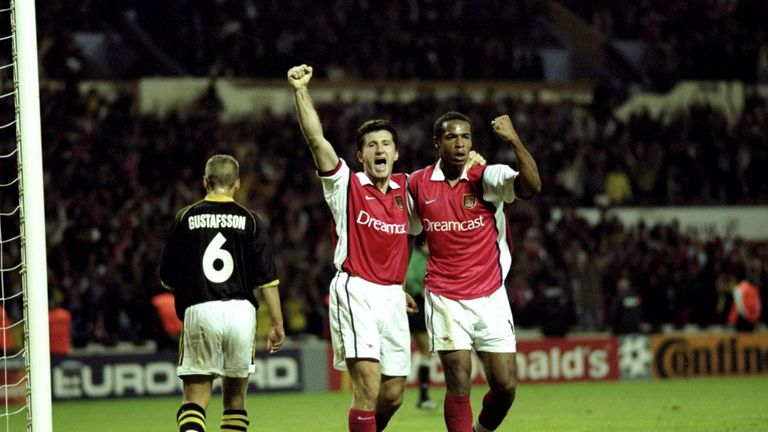 Davor Suker and Thierry Henry of Arsenal celebrate during the UEFA Champions League match between Arsenal v AIK Solna