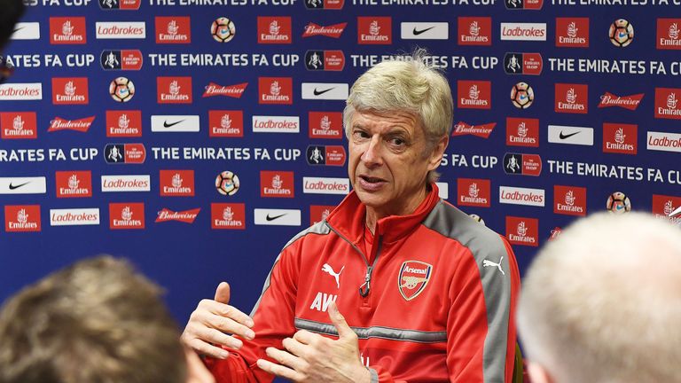 Arsene Wenger attends a press conference at London Colney